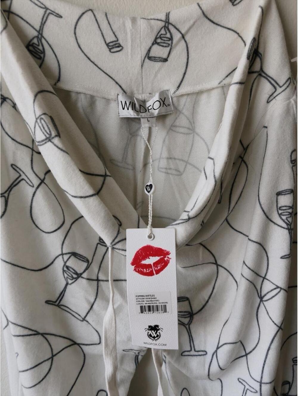 Wildfox white pants with black line drawings of wine bottles and glasses. NWT